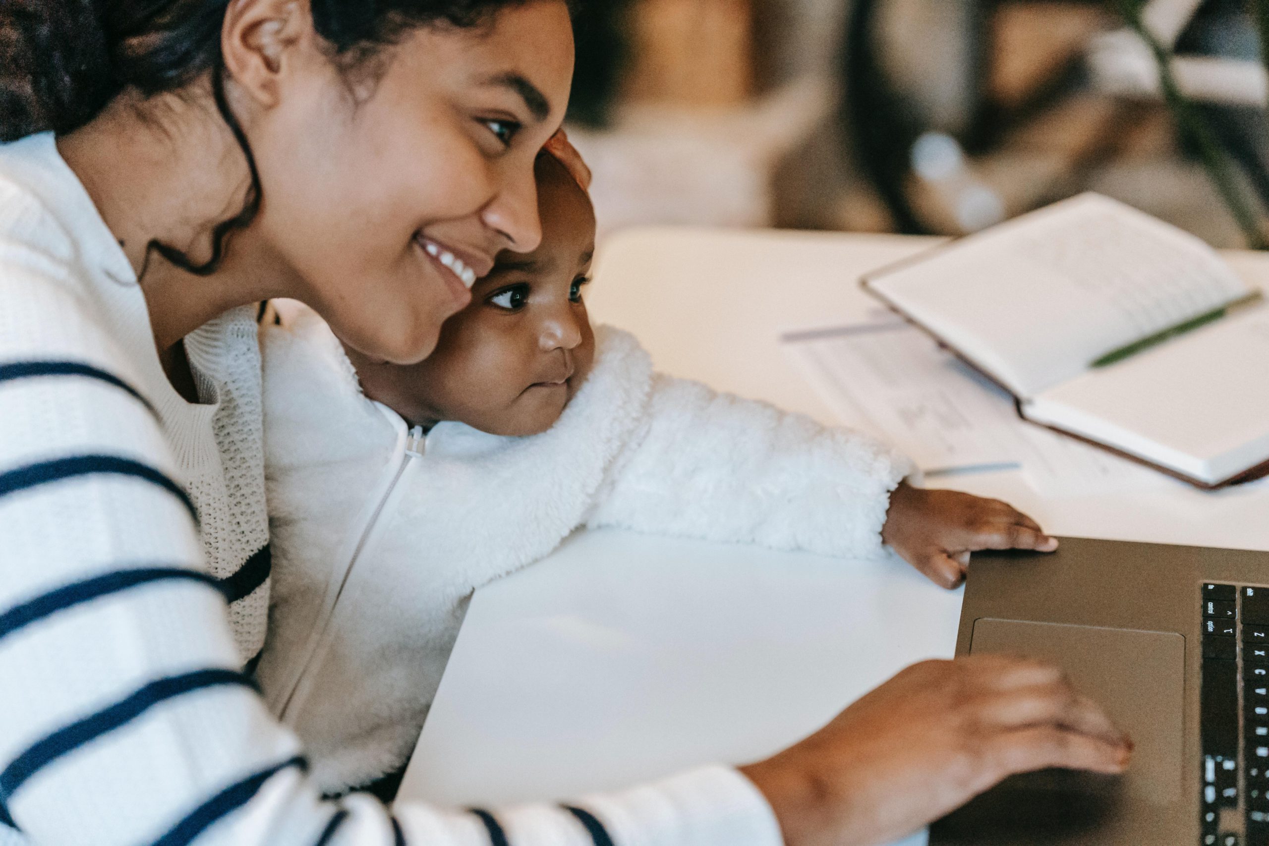 Woman working with her child | Batelle